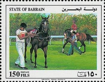 Trainers Leading Horses