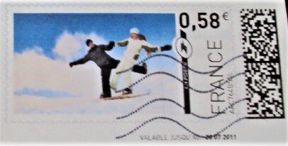 Couple Snowboarding