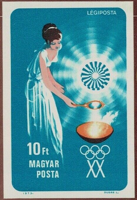 Woman lighting Olympic Flame