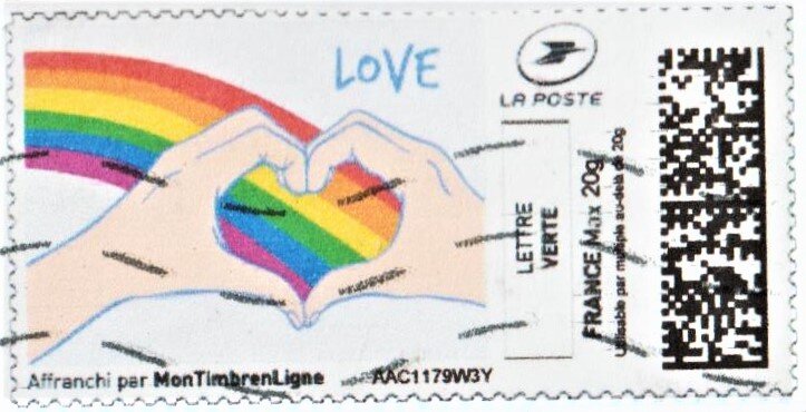 Love. Rainbow and Hands forming a Heart
