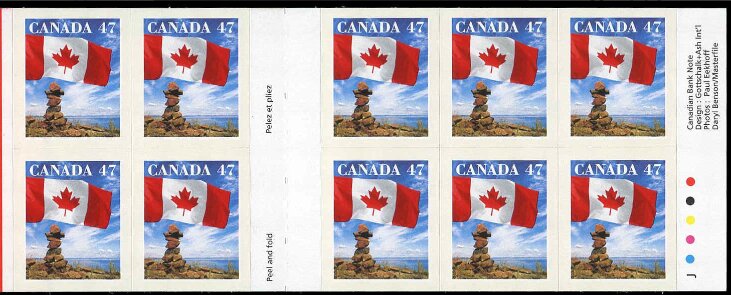 Canadian Flag and Inuit Cairn
