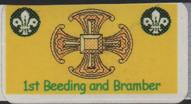 2 Scout badges and a Cross in between