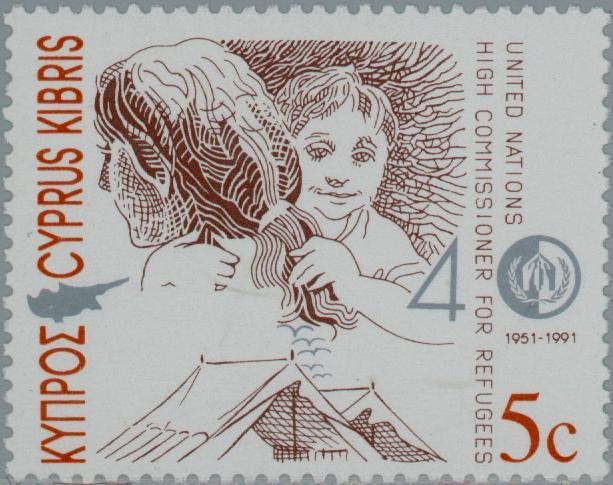 Mother holding child in arms