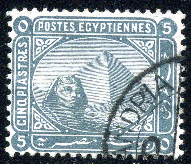 Sphinx in front of Cheops pyramid