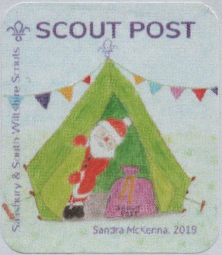Santa in tent with sack of Scout post