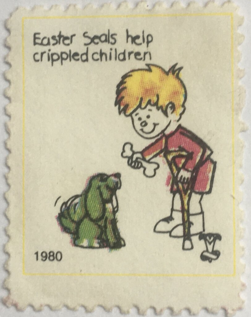Disabled Boy feeding Dog. Easter Seals
