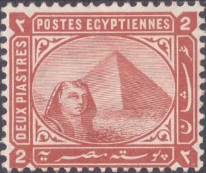 Sphinx in front of Cheops pyramid