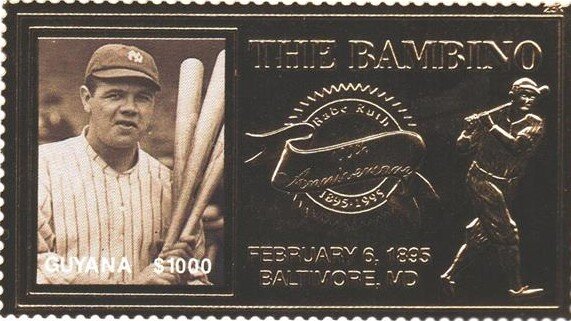 Babe Ruth with three bats