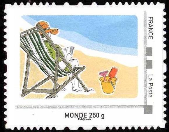 Woman in deck chair on a beach