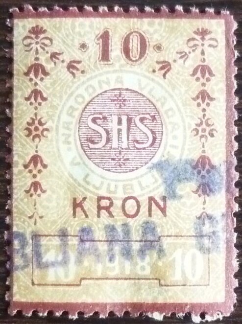 "SHS" in circle