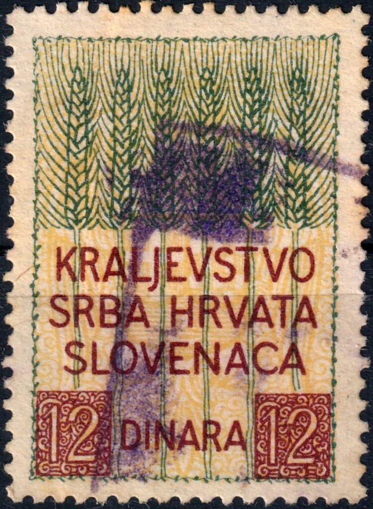 Wheat above coat of arms