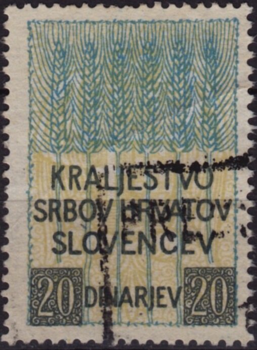 Wheat above coat of arms