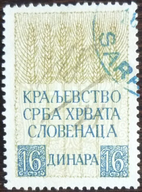 Wheat above coat of arms