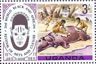 Stamp, Prehistorical tribe skinning a hippopotamus, Uganda,  , Prehistory, Feasts, Hunting