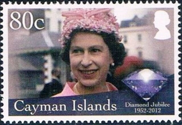 Queen Elizabeth II wearing pink hat