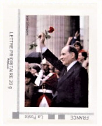 Francois Mitterrand waving