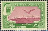 Falcon flying over bridge