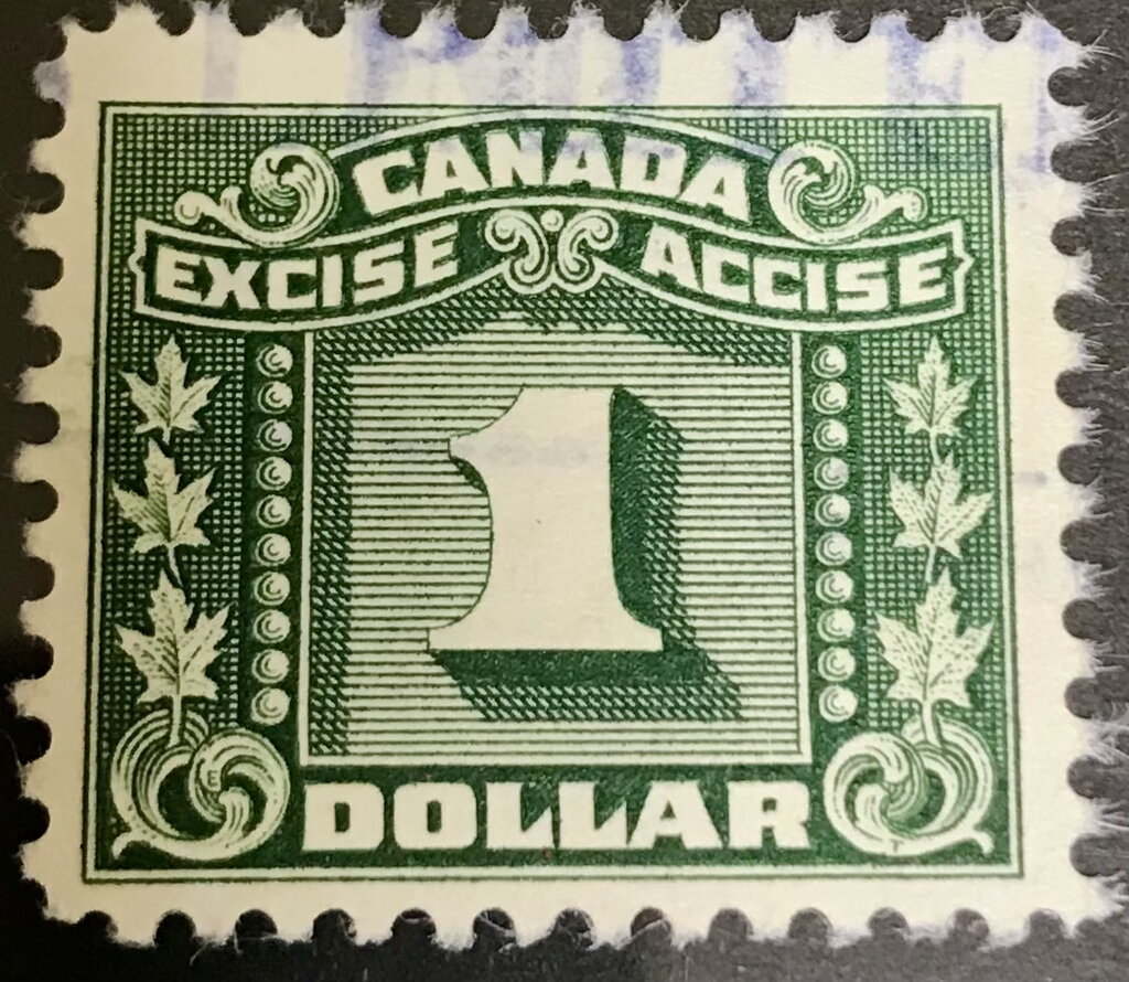 Numeral with three maple leaves on each side