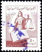 Allegory of Justice with scales and book