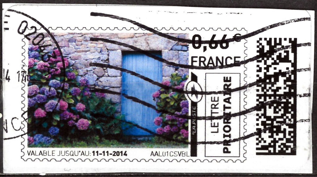 Cottage in Brittany. Hydrangeas and a Blue Door