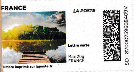 View of Woods across lake from jetty without laposte logo