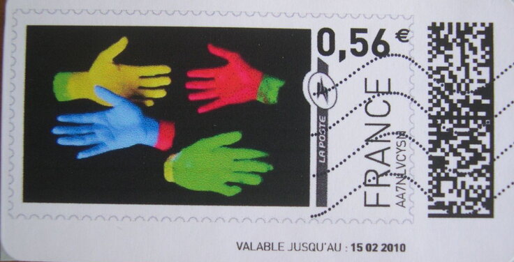 Four coloured gloves
