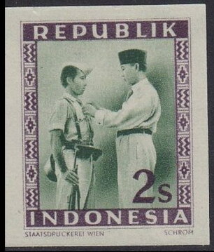 President Soekarno Decorates a Soldier