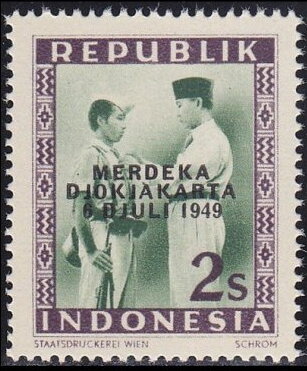 President Soekarno Decorates a Soldier