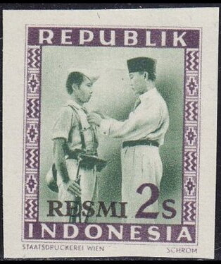 President Soekarno Decorates a Soldier overprinted