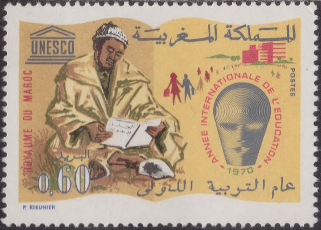 Man Reading Book, Intl. Education Year Emblem