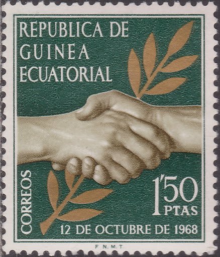 Clasped hands and laurel
