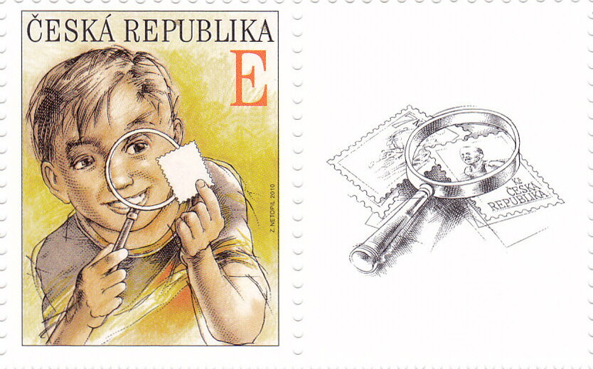 Boy with magnifying glass
