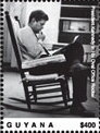 John Kennedy Seated in Chair (Facing Right)