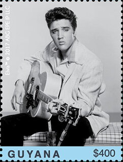 Sitting, Playing Guitar