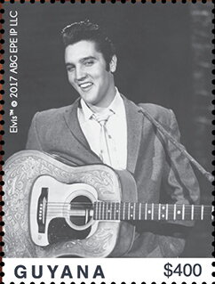 With Guitar Slung over Shoulder