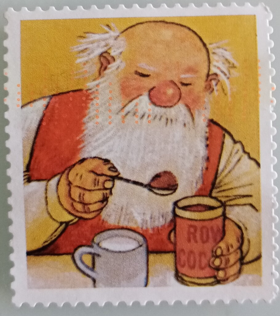 Father Christmas making cocoa