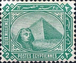 Sphinx in front of Cheops pyramid