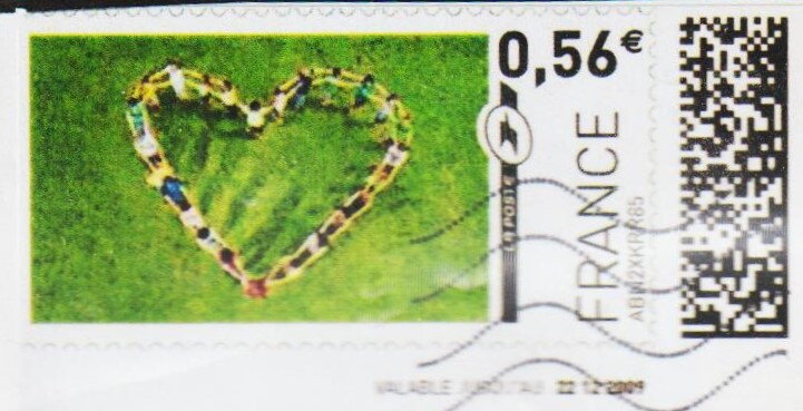 Crowd of people making a heart shape