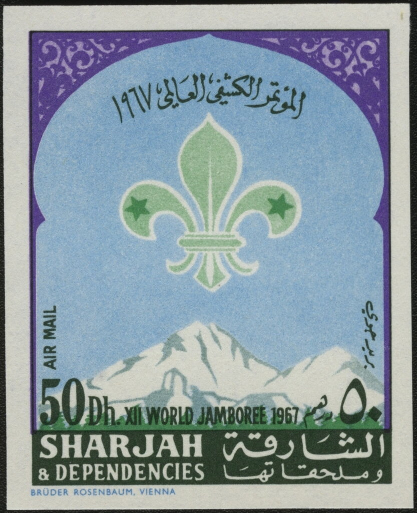 Boy Scout Emblem over Snowy Mountains