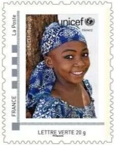 Unicef Girl in a blue head scarf