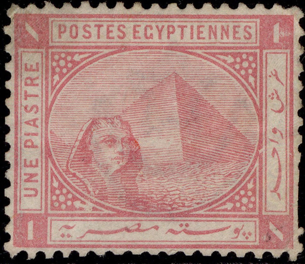 Sphinx in front of Cheops pyramid
