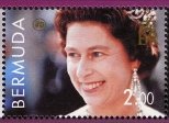 Queen Elizabeth II wearing tiara and large earrings