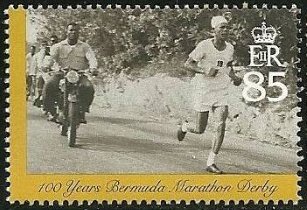 Motorcyclist following runner