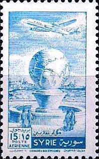 Airplane over globe and fountain