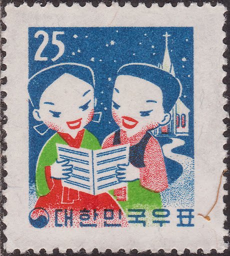 Children singing Christmas hymns