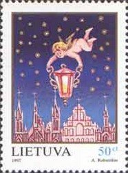 Angel holding lantern above town