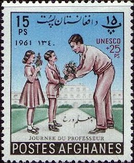 Children giving flowers to teacher