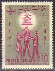 3 People carrying the UNESCO symbol