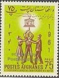 3 People carrying the UNESCO symbol
