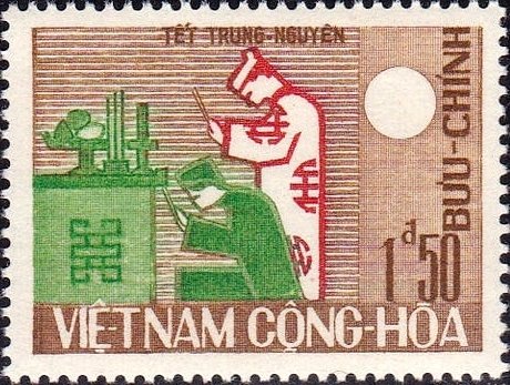 Man and woman making offerings
